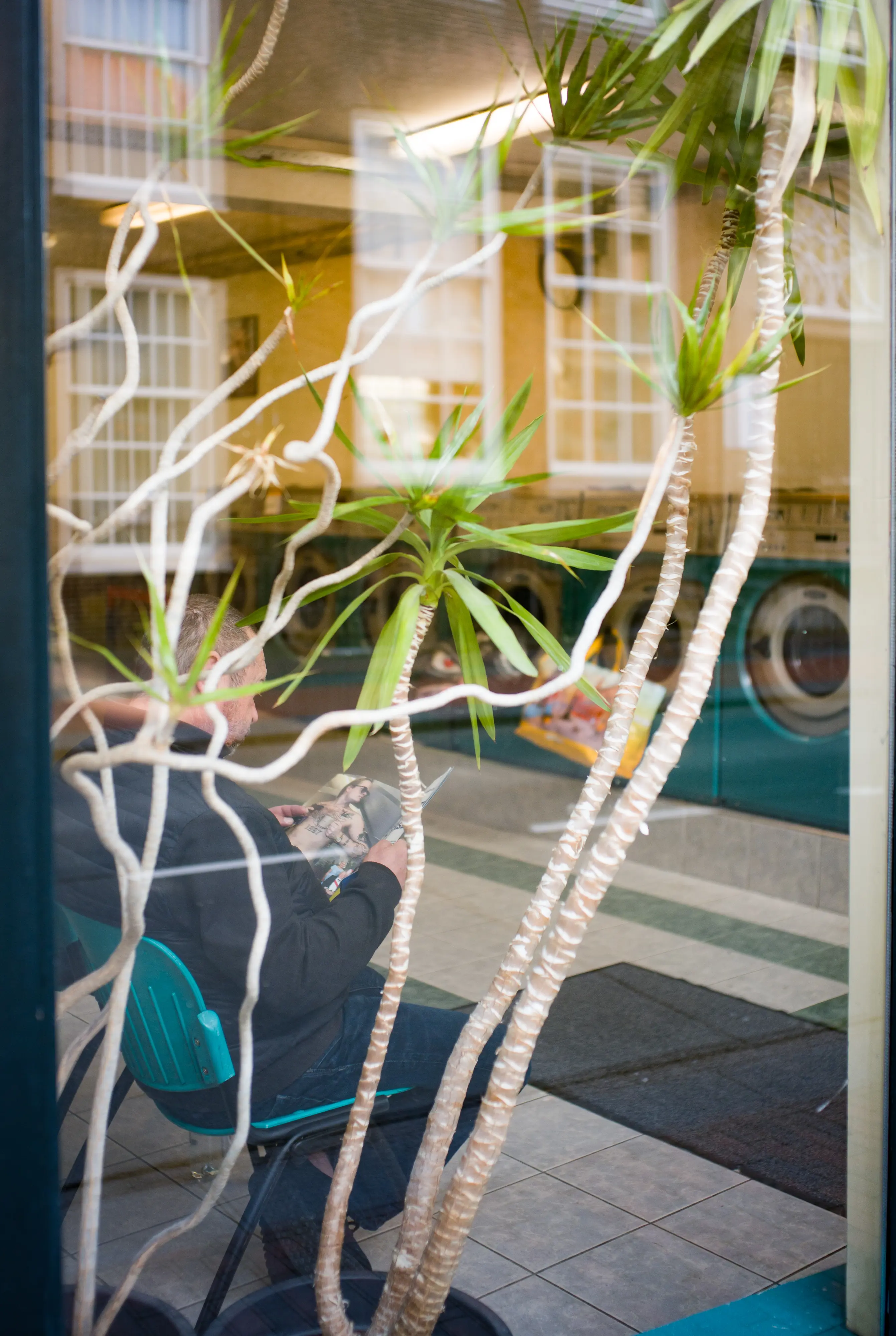 Reflection at self-service laundry @ f/4