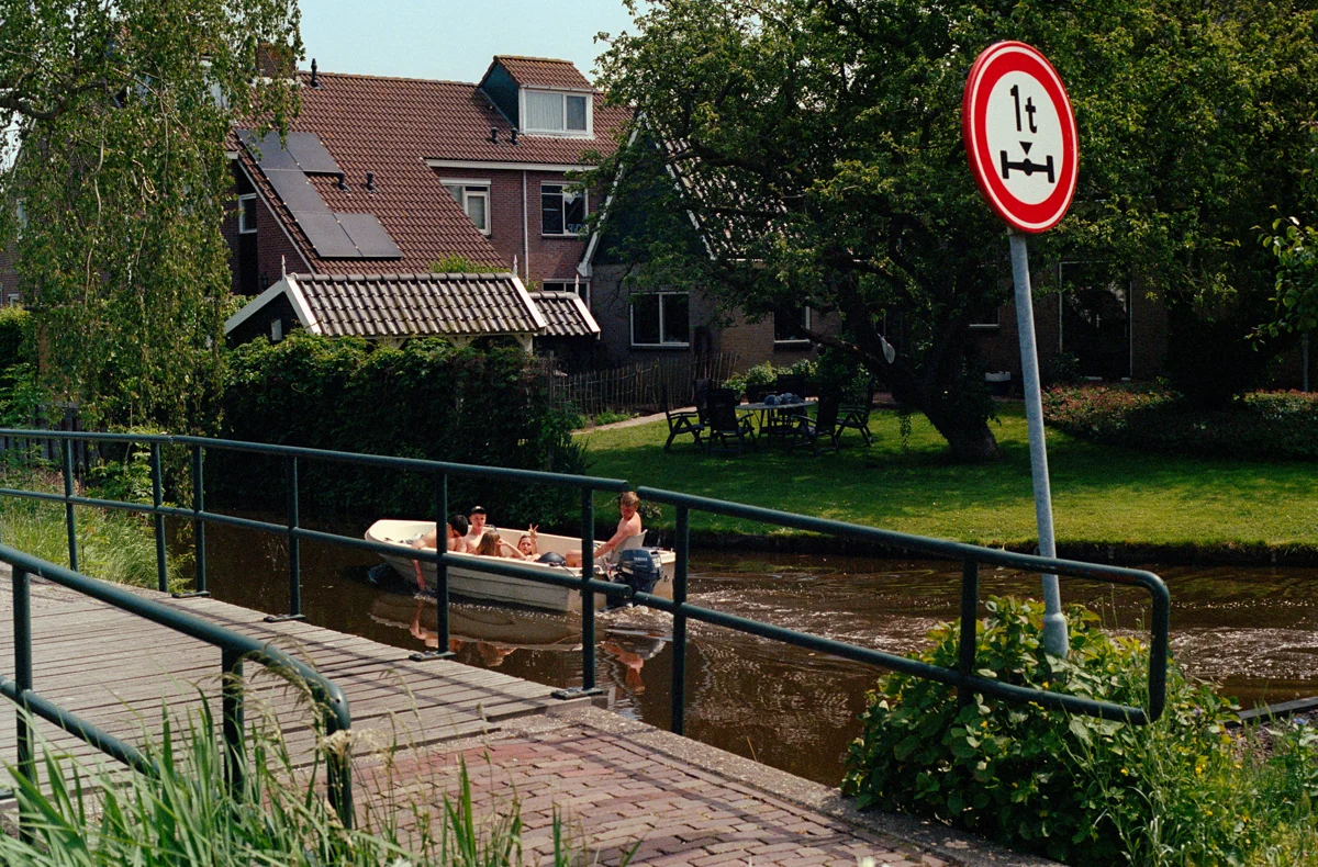 Portra 400 image of people relaxing in a boat